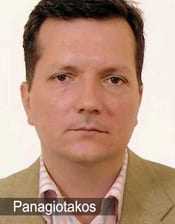 Portrait of a serious man in a tan jacket, labeled “Panagiotakos.”
