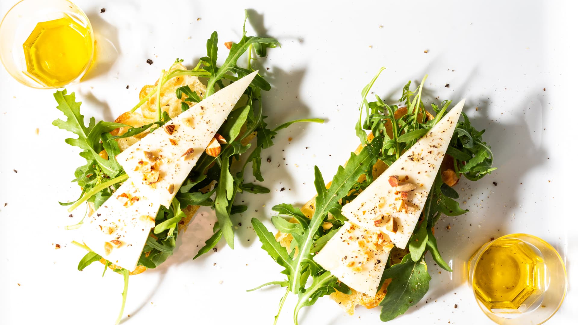 Brushette with cheese, vegetables and two oils for pairing and tasting