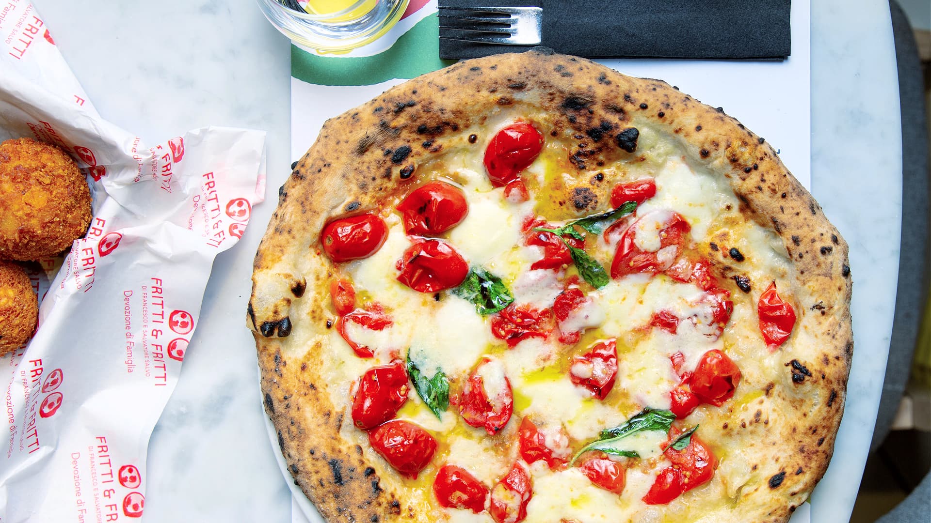 ‘Margherita del Vesuvio’ with preserved ‘Pomodorino del Piennolo del Vesuvio’ DOP cherry tomatoes, Campania DOP buffalo mozzarella, an extra virgin olive oil from Campania (Photo Pizzeria Salvo)