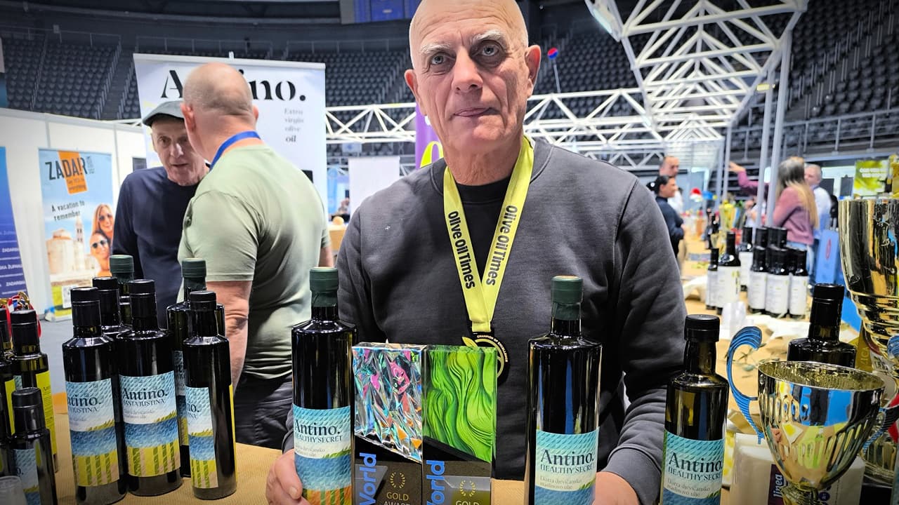 Ante Vulin of Pakoštane displays his oils after local producers earned seven awards at the 2026 NYIOOC.