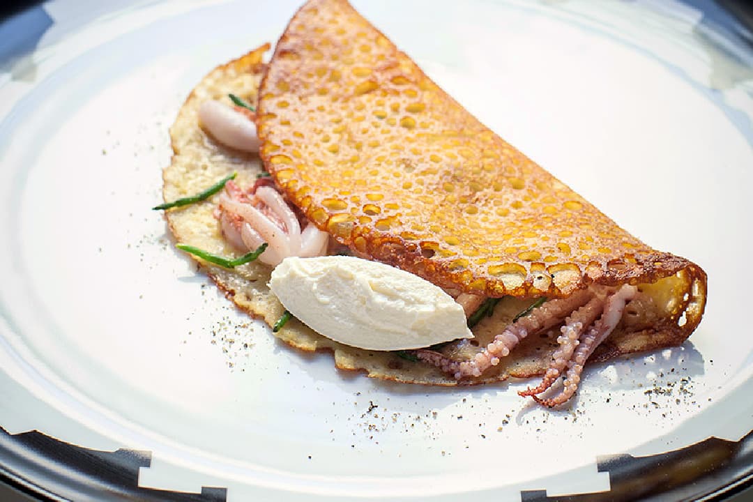 Chickpea cake with baby squid, samphire and robiola (Photo by Andrea Moretti and Liudmila Musatova)